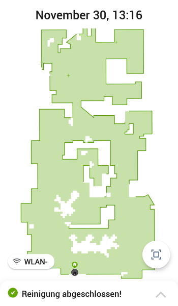 Ist das Gerät mit dem Saugen fertig, können Sie sich in der App eine Karte ansehen. Hellgrüne Bereiche wurden gereinigt, weiße Bereiche waren für den Roboter nicht erreichbar. Die kleinen grünen Kreuze markieren Stellen, an denen die Dirt Detect Technologie angewendet wurde.